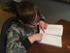 Owen Reading Where Would YOu Fly Book 3.3.18